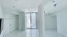 High-gloss floor tiling, ceiling-height glass sliding doors, structural architectural pillar, and recessed ceiling lighting