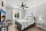 Room on 1st Floor featuring wood-finish flooring, a ceiling fan with integrated lighting, recessed lighting, crown molding, and a sliding window