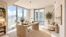 Floor-to-ceiling windows, high-gloss tile flooring, and sliding glass door access to a private balcony ( AI used for interiors )