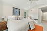 Primary Bedroom looking towards the Closets and ensuite Bathroom