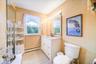 Large and sunny second floor full bath with tub-shower.