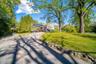 Lovely circular drive offers a grand entrance and plenty of parking!