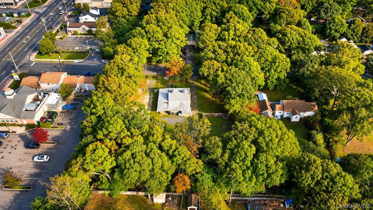 Additional aerial perspective of the property and surrounding area.