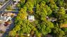 Additional aerial perspective of the property and surrounding area.