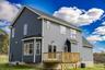 Back View of Newly Complete Carson Model Rear Elevation Featuring Deck.