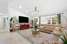 Open-concept living area featuring tile flooring, recessed lighting, and a ceiling fan