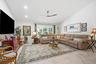 Vaulted ceilings featuring recessed lighting, a modern ceiling fan, large-format tile flooring, and a triple-pane window configuration with plantation