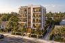 Multi-story residential building featuring a modern stucco facade, glass-panel balconies, full-height window walls, and landscaped ground-level hardsc