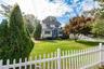 You can call this charming, Two-story Colonial/farmhouse with a white picket fence your home! Features light-toned vinyl siding, blue window shutters,