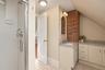 Bathroom on the 2nd floor with stone countertops and skylight.