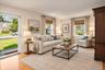 VIRTUALLY STAGED-Living room with hardwood floors