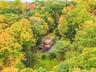 A private woodsy oasis and only 2 miles from Croton Harmon RR Station with express service under an hour to Grand Central Terminal.
