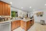 Kitchen view toward dining area. The chef isn't isolated from their guests, with this open design.