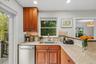 Functional kitchen space with an abundance of natural light.