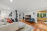 Functional and open floor plan with view from living room to office and dining rooms.