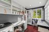 Wonderful built-ins, shelving, high hats & sunny & bright.