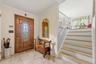 Bright and inviting foyer leading into the home