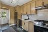 With slate tile flooring and SS appliances