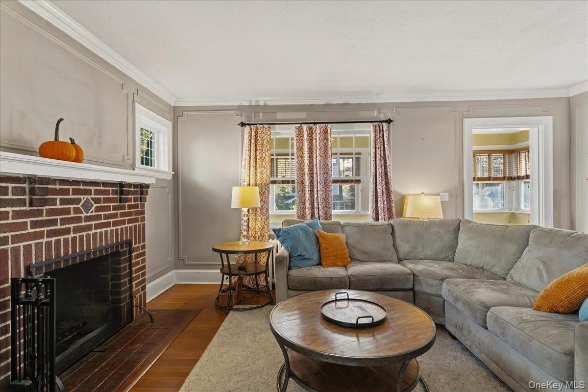 With brick wood burning fireplace