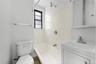 Bathroom featuring vanity and bathtub / shower combination