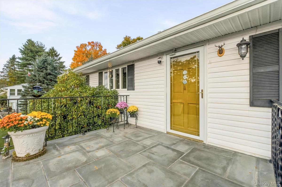 Large bluestone patio - great place to enjoy morning coffee while taking in the mountain views.