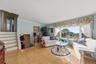 open concept with upper level staircase to bedrooms