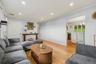 Livingroom leads into large EIK kitchen w/walkout to backyard