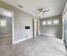 Guest House measures approximately 20x23, includes 1 bedroom, 1 full bathroom, living room, impact glass sliders with remote controlled shades.