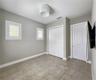 Guest House measures approximately 20x23, includes 1 bedroom, 1 full bathroom, living room, impact glass sliders with remote controlled shades.