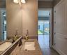 Guest House measures approximately 20x23, includes 1 bedroom, 1 full bathroom, living room, impact glass sliders with remote controlled shades.