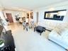 white leather sect sofa, Large Flat TV, upscale furnished