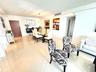 white leather sect sofa, Large Flat TV, upscale furnished