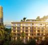 Multi-story residential building featuring floor-to-ceiling glass windows, individual private balconies with glass railings, and a landscaped rooftop 
