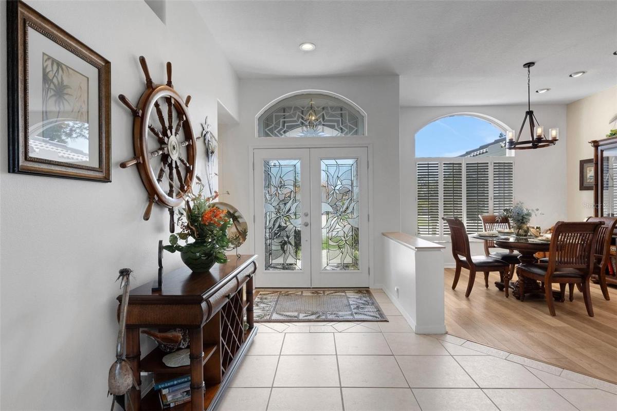 Beautiful laded glass front door and transom