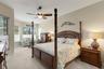Huge primary bedroom with sitting area and views