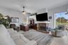 Family room with view of golf course and pool
