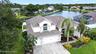 Lakefront living in gated Sunset Lakes