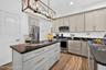 Shaker cabinets, stainless appliances