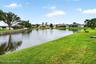 Lakefront backyard with open views