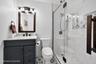 Updated bath with frameless shower