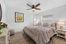 Guest bedroom with ceiling fan