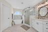 Soaking tub and dual vanities