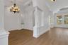New luxury vinyl plank flooring throughout the first floor and freshly painted from ceiling to baseboards.