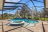 The oversized pool area has it all  . . .