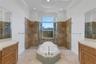 Outside the shower is a small courtyard for additional privacy.
