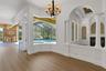 The casual dining area will accommodate a larger table fitting to the home's overall design purpose.