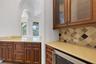 The butler's pantry and bar frees up valuable countertop space when entertaining.