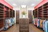 13x13 dual sided walk-in closet with custom storage.