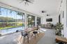 32 FT+ covered, screened, rear porch with TV and fans.