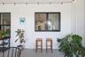 Pass through window from kitchen to rear porch for entertainment nad hosting.